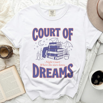 White t-shirt with purple and pink text and illustration.