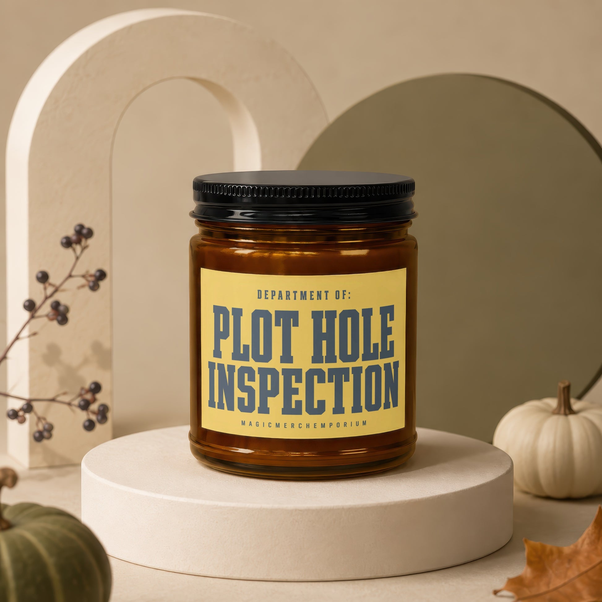 Amber glass candle with "Plot Hole Inspection" text on yellow label.