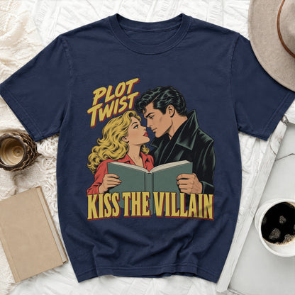 Navy t-shirt with comic art of a couple reading a book, text reads "Plot Twist Kiss The Villain".