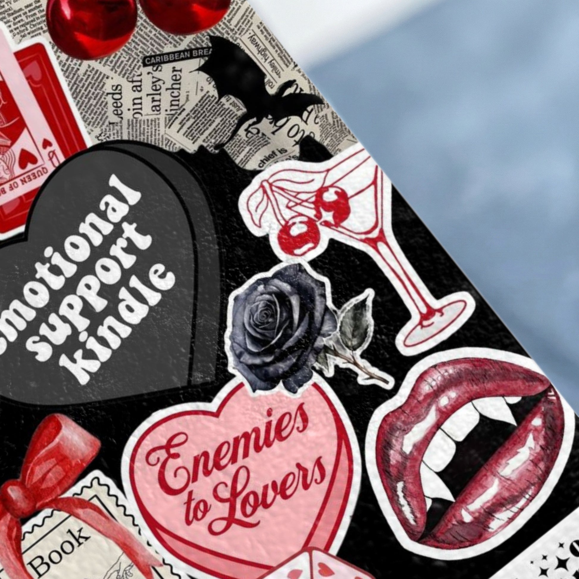 Vampire-themed stickers include lips, bats, hearts, and "Emotional Support Kindle."