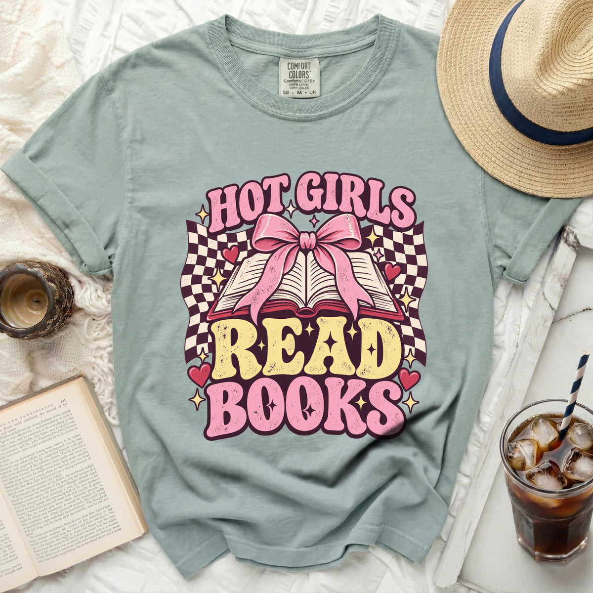 Light blue t-shirt with "Hot Girls Read Books" graphic and pink bow.