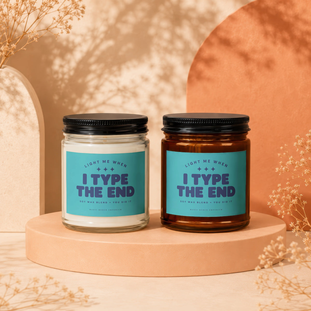 Two candles with teal labels reading "I TYPE THE END" on pedestals.