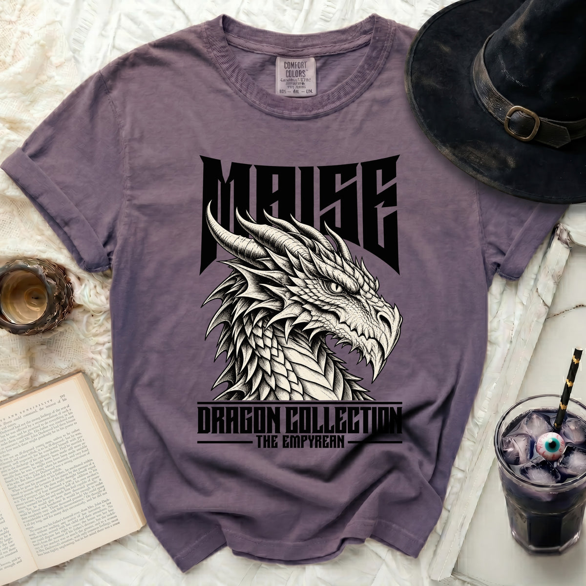 Purple t-shirt with "MAISE DRAGON COLLECTION THE EMPYREAN" text and dragon graphic.
