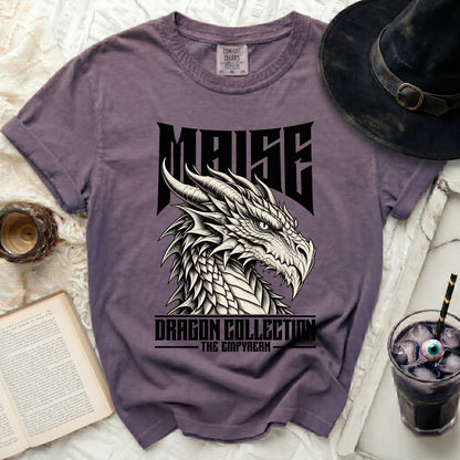 Purple t-shirt with "MAISE DRAGON COLLECTION THE EMPYREAN" text and dragon graphic.