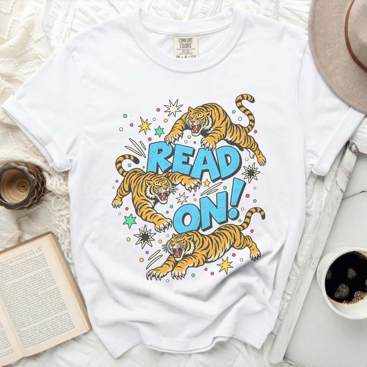White t-shirt with three tigers and "READ ON!" text graphic.