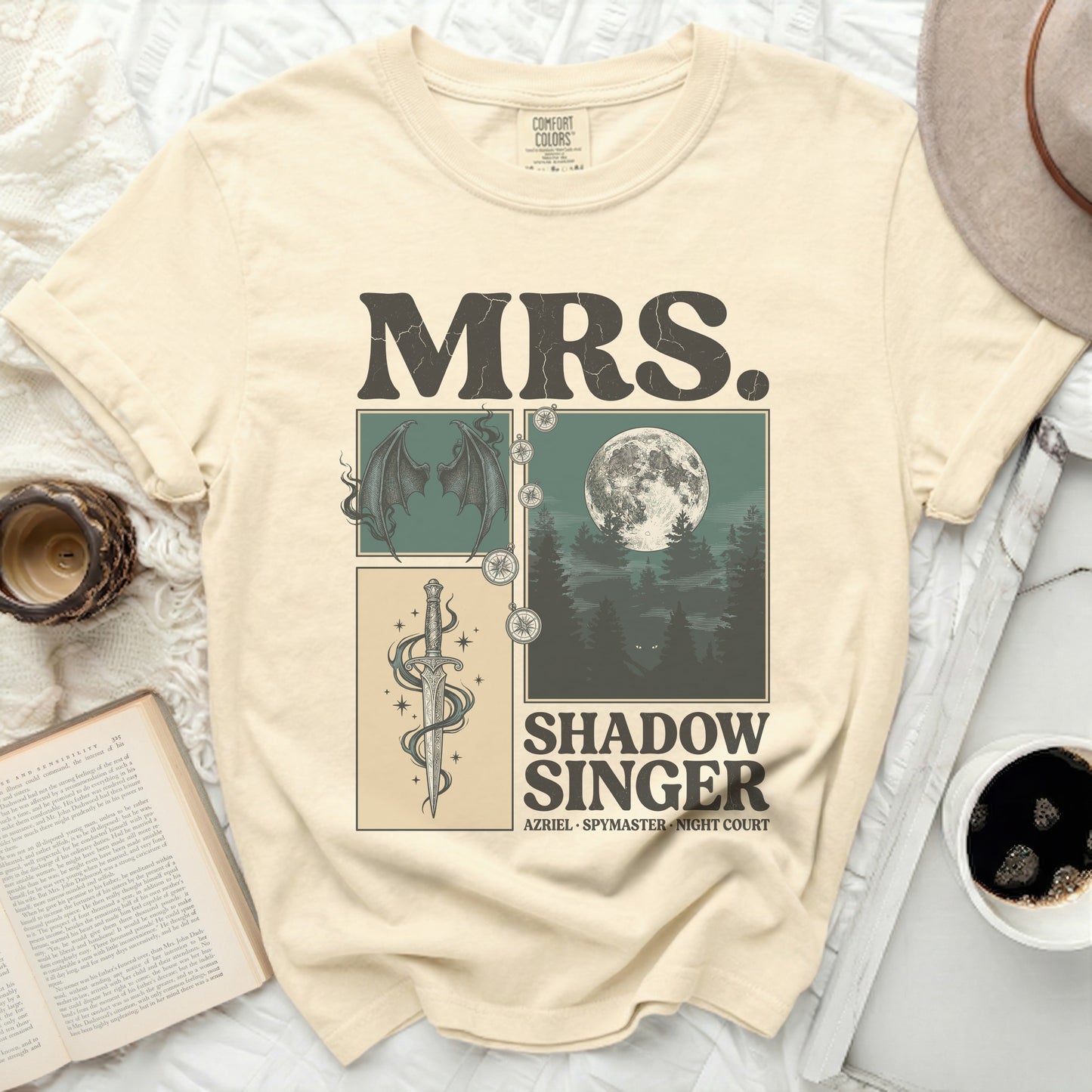 Cream t-shirt with "MRS. SHADOW SINGER" in distressed lettering and gothic art.