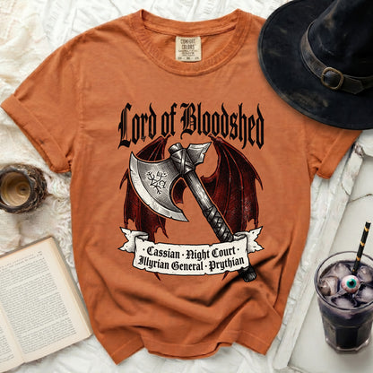 Orange t-shirt with "Lord of Bloodshed" and axe graphic.