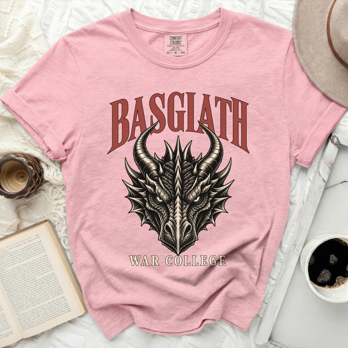 Pink t-shirt with "Basgiath War College" and a dragon head graphic.