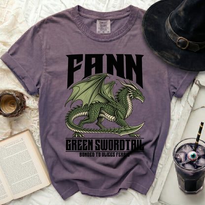 Purple t-shirt with green dragon graphic and text "FANN GREEN SWORDTAIL BONDED TO ULICES FERRIS".