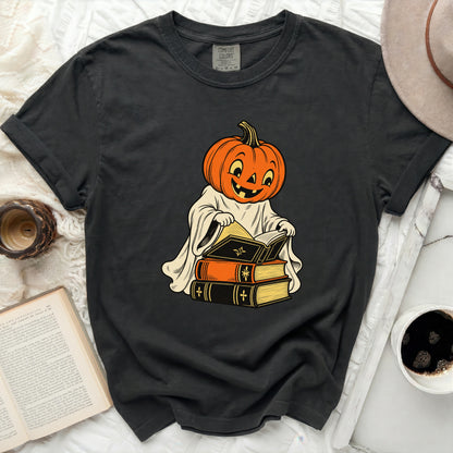 Dark gray t-shirt with a vintage-style pumpkin ghost reading books graphic.