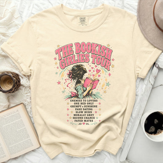 Cream t-shirt with "The Bookish Girlies Tour" text and book-themed quotes.