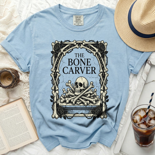 The Bone Carver graphic tee with skull and crossed bones.