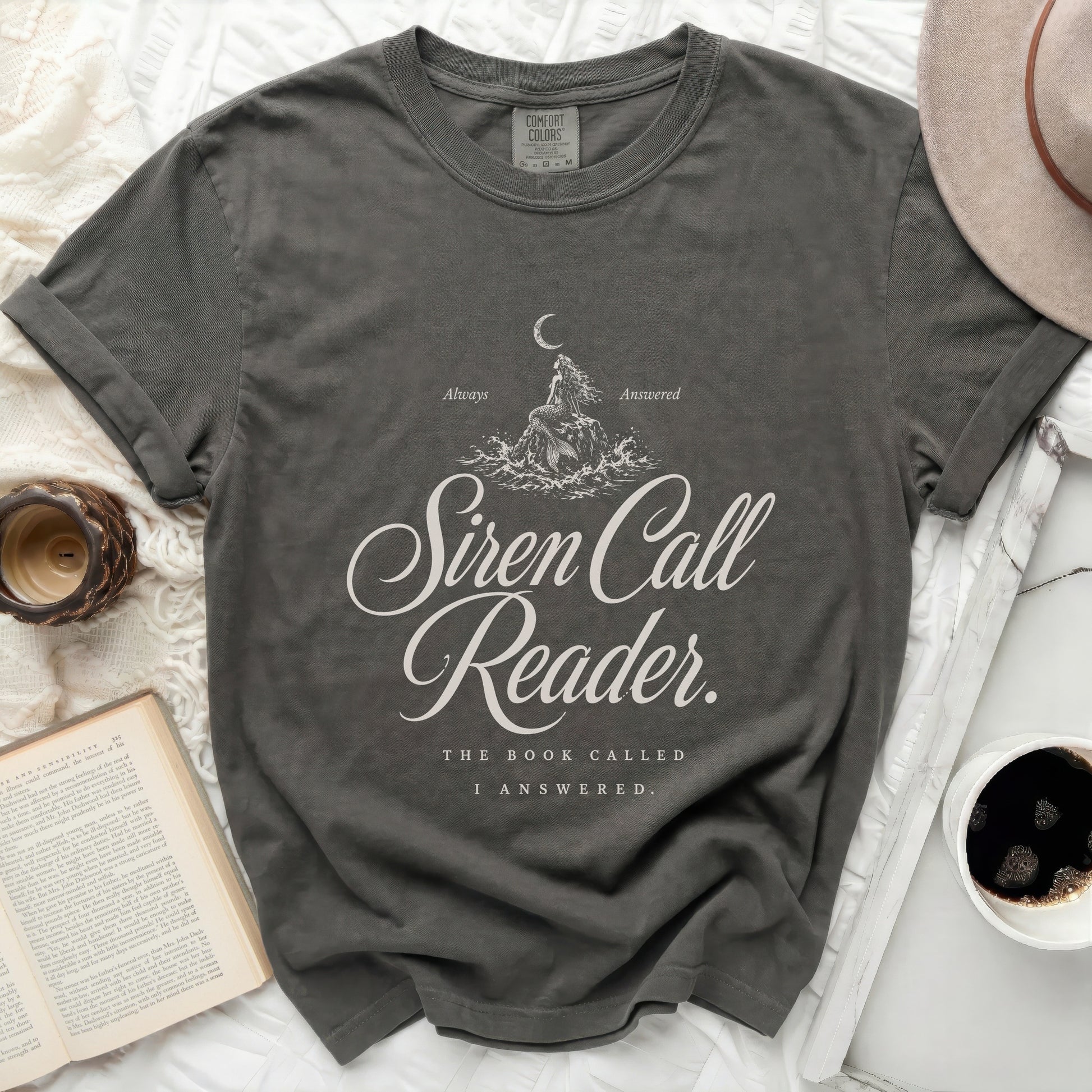 Dark gray t-shirt with "Siren Call Reader" text and a wave graphic.