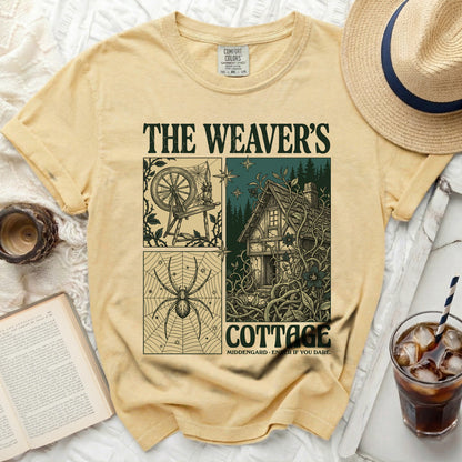 The Weaver's Cottage shirt with spinning wheel, spider, and cottage graphic.