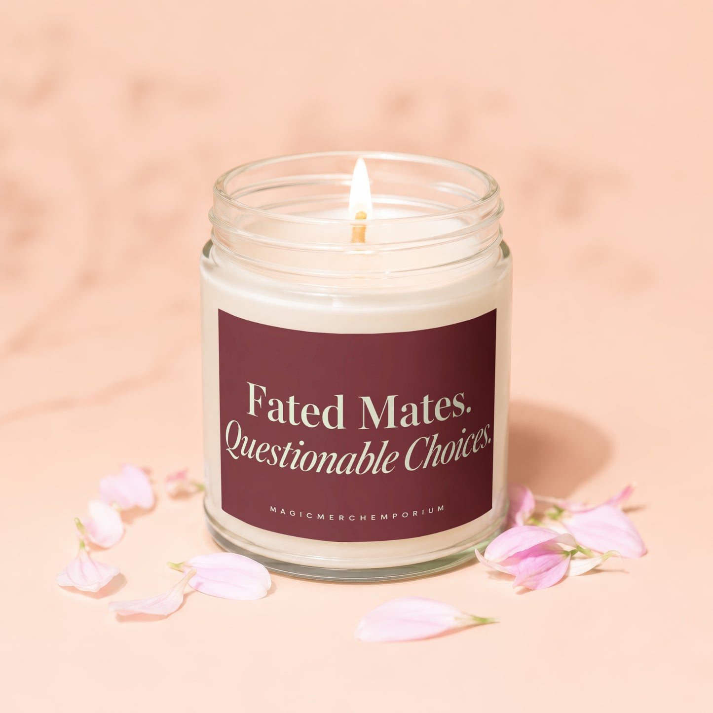 Lit candle in glass jar with "Fated Mates. Questionable Choices." label.