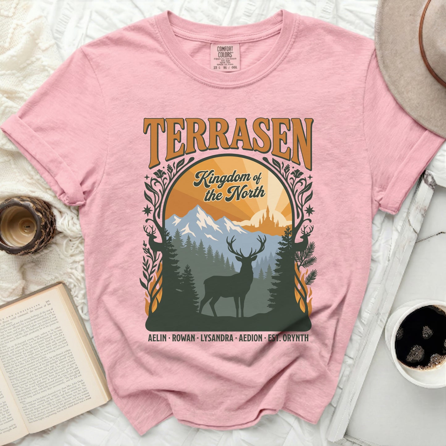 Pink t-shirt with "Terrasen Kingdom of the North" text and deer graphic.