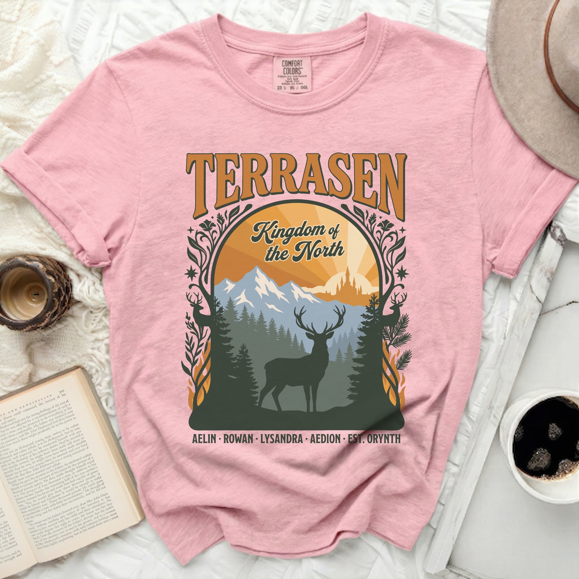 Pink t-shirt with "Terrasen Kingdom of the North" text and deer graphic.