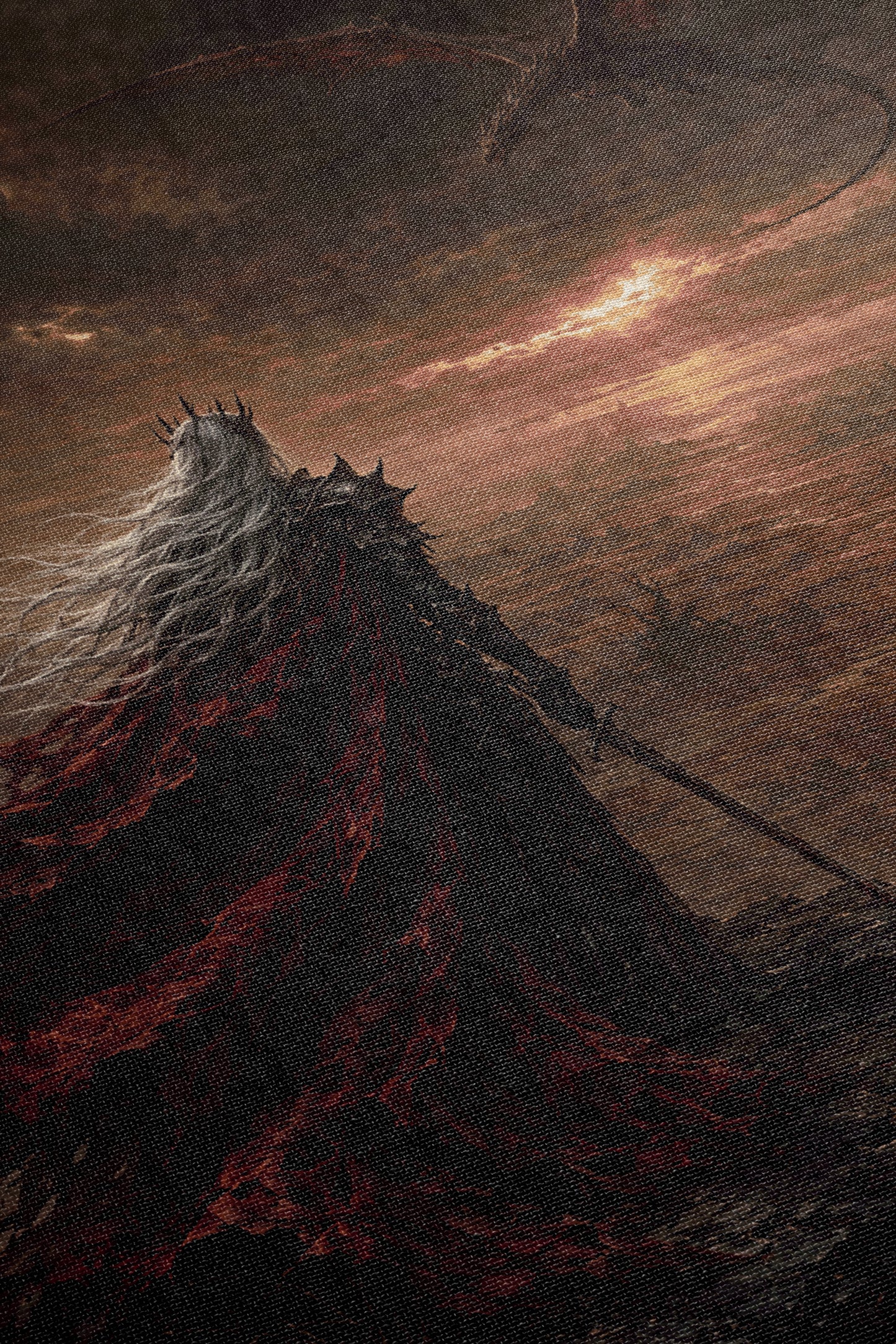 a dark, ominous scene with a figure in a red cape and a sword, set against a dramatic sky with a fiery sunset.