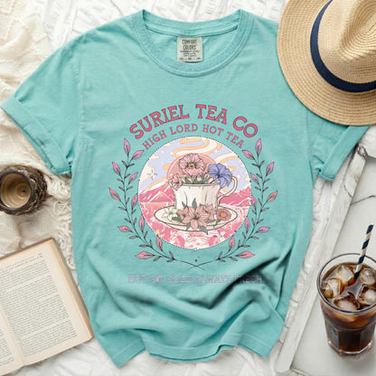 Turquoise t-shirt with "Suriel Tea Co. High Lord Hot Tea" and floral teacup graphic.