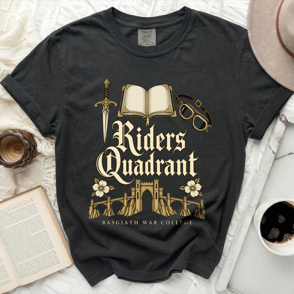 Dark gray t-shirt with "Riders Quadrant Basgiath War College" text and fantasy graphics.