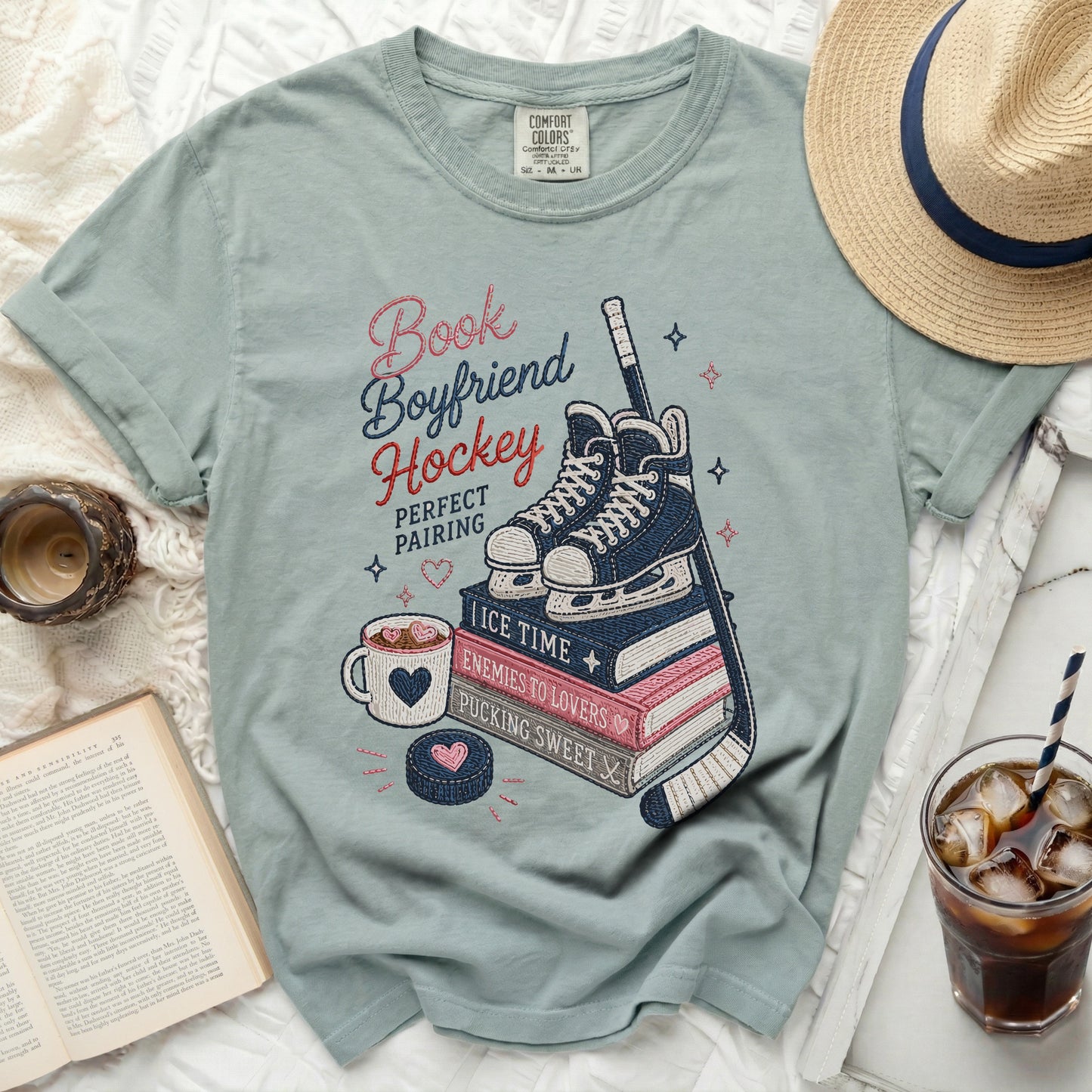 Light blue t-shirt with "Bookboyfriend Hockey Perfect Pairing" graphic.