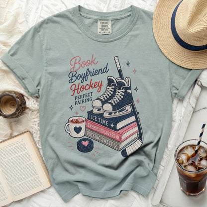 Light blue t-shirt with "Bookboyfriend Hockey Perfect Pairing" graphic.