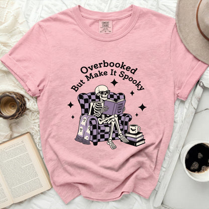 Skeleton reading "Tome Sweet Tome" on pink Comfort Colors shirt