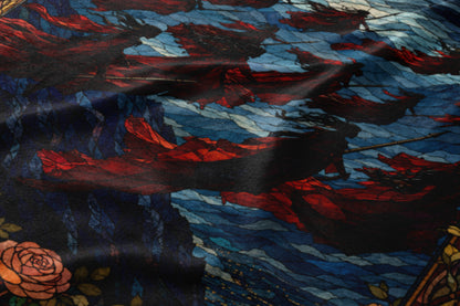 Crimson and blue fabric with a stained-glass effect featuring flowing figures and a rose.