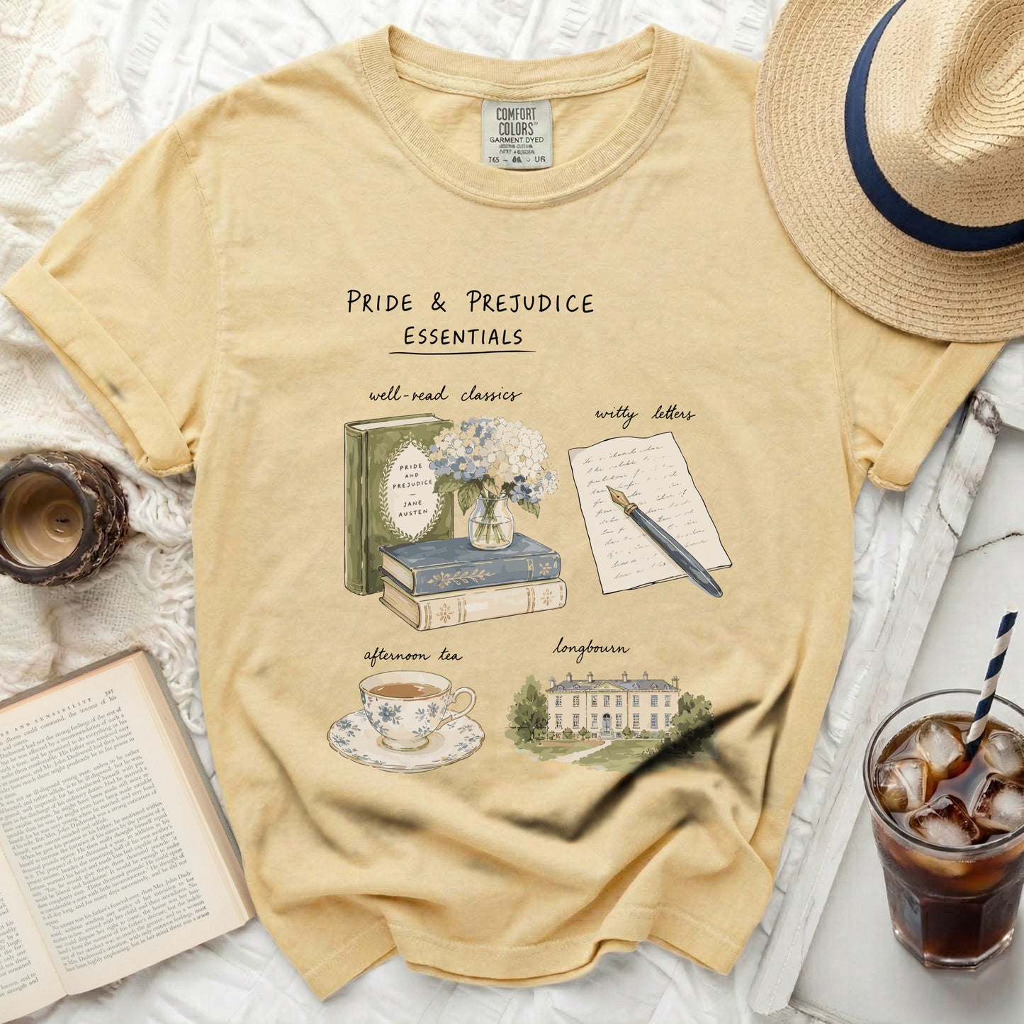 Yellow t-shirt with Pride & Prejudice essentials graphic.