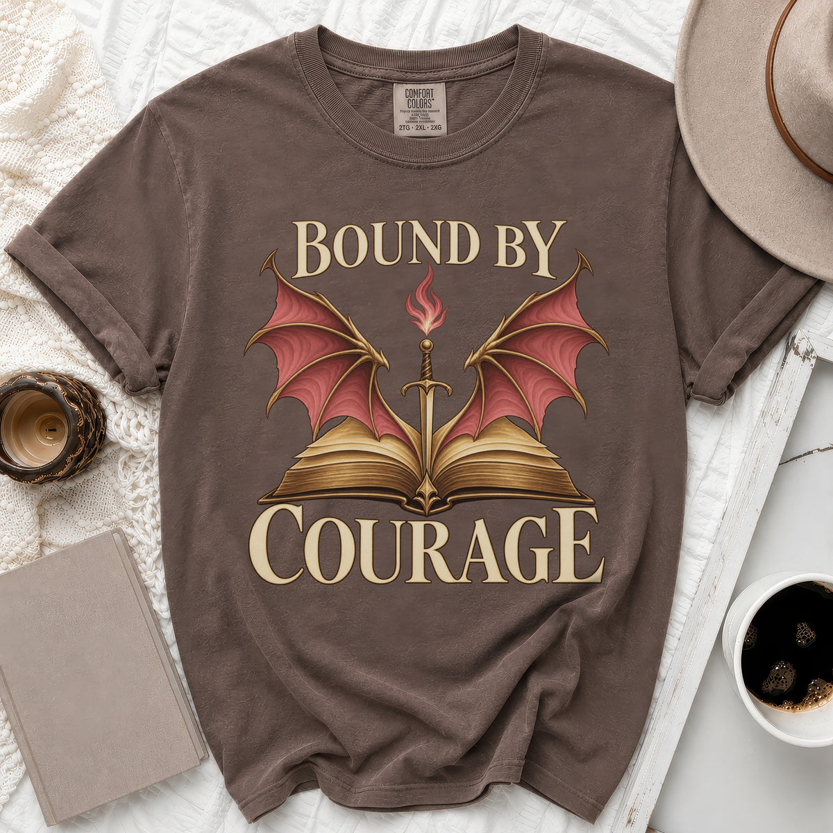 Brown t-shirt with "Bound by Courage" text and sword with dragon wings.