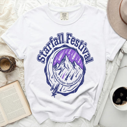 White t-shirt with "Starfall Festival City of Starlight Annual Celebration" graphic.