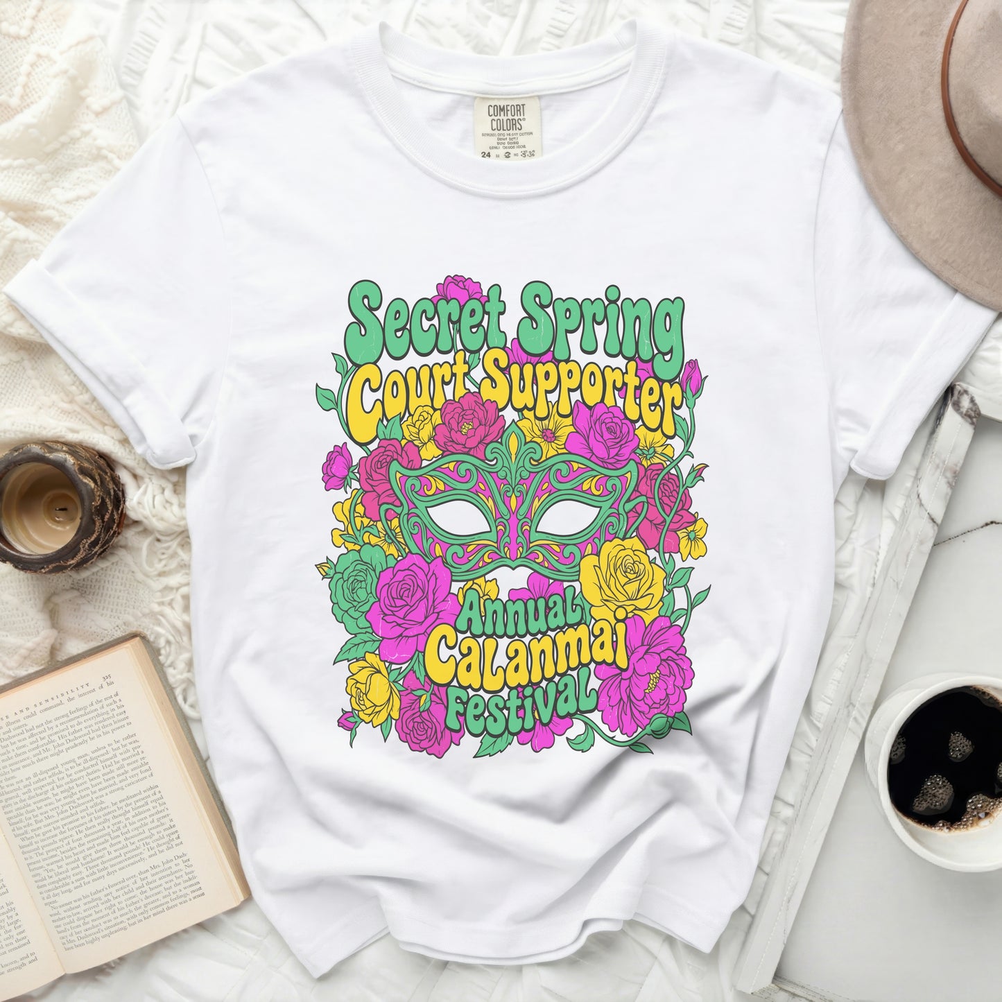 White t-shirt with "Secret Spring Court Supporter Annual Calanmai Festival" graphic.