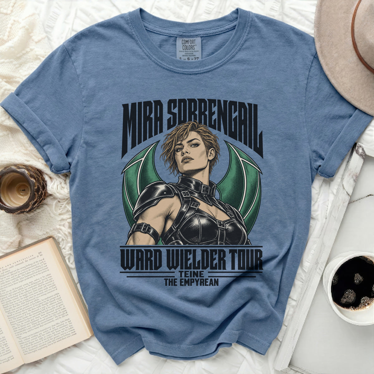Blue t-shirt with "Mira Sorrengail Ward Wielder Tour" and "Teine The Empyrean" graphics.