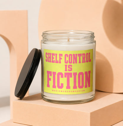 Glass jar candle with "Shelf Control Is Fiction" text on a yellow label.