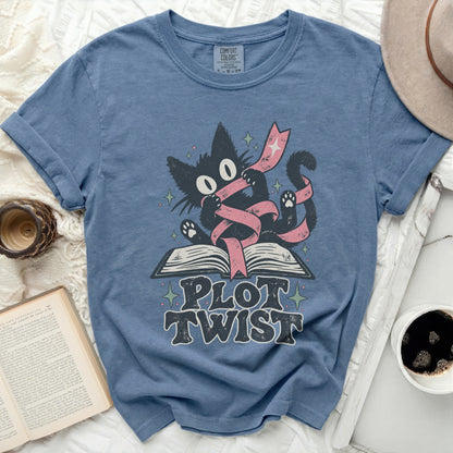 Black cat on open book with pink ribbon and "Plot Twist" text.