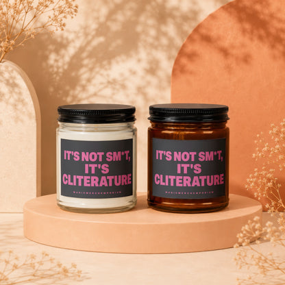 Two candles display labels reading "It's Not Sm*t, It's Cliterature."