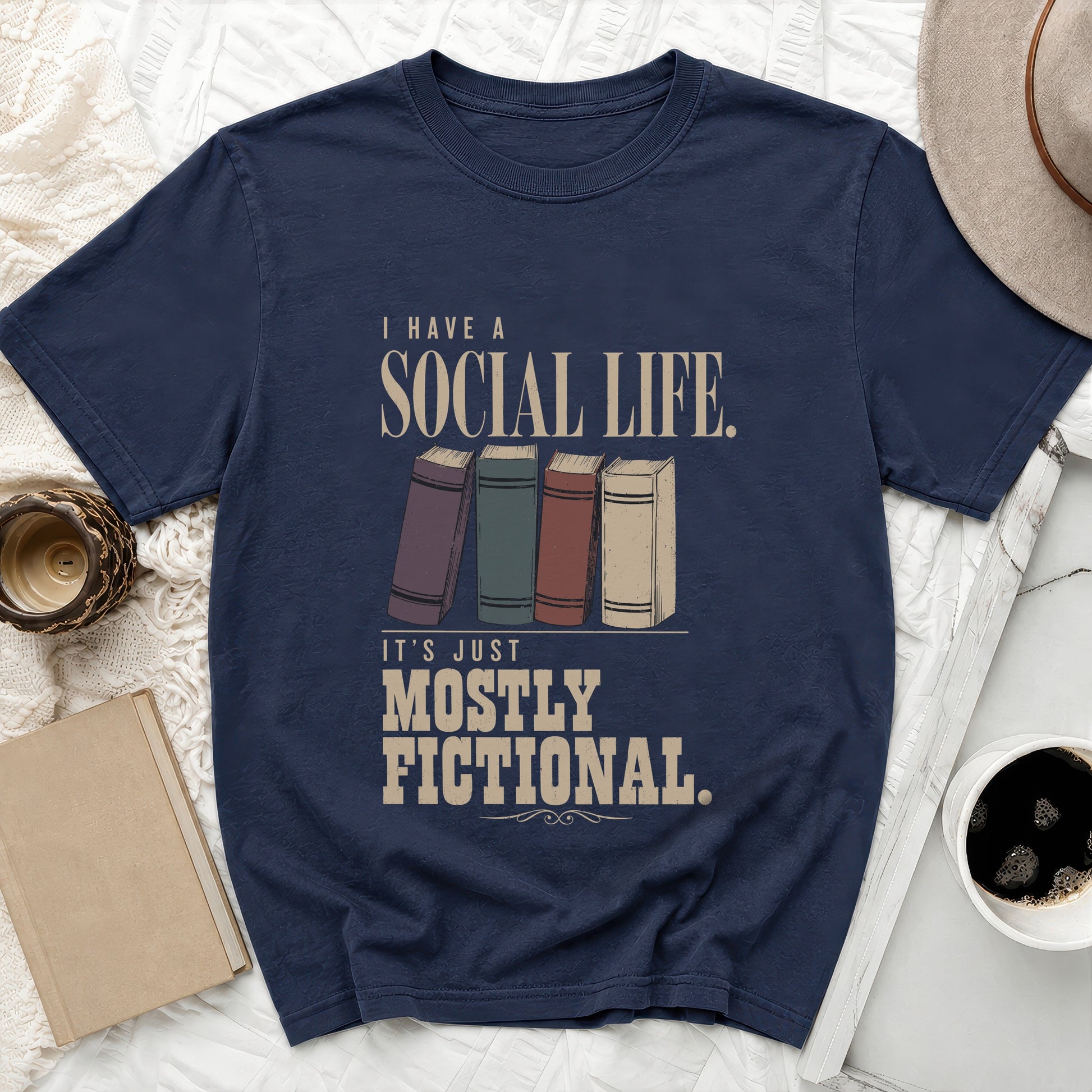 Navy t-shirt with text "I HAVE A SOCIAL LIFE. IT'S JUST MOSTLY FICTIONAL." and books graphic.