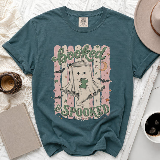 Teal t-shirt with "Booked & Spooked" text and a ghost holding a book.