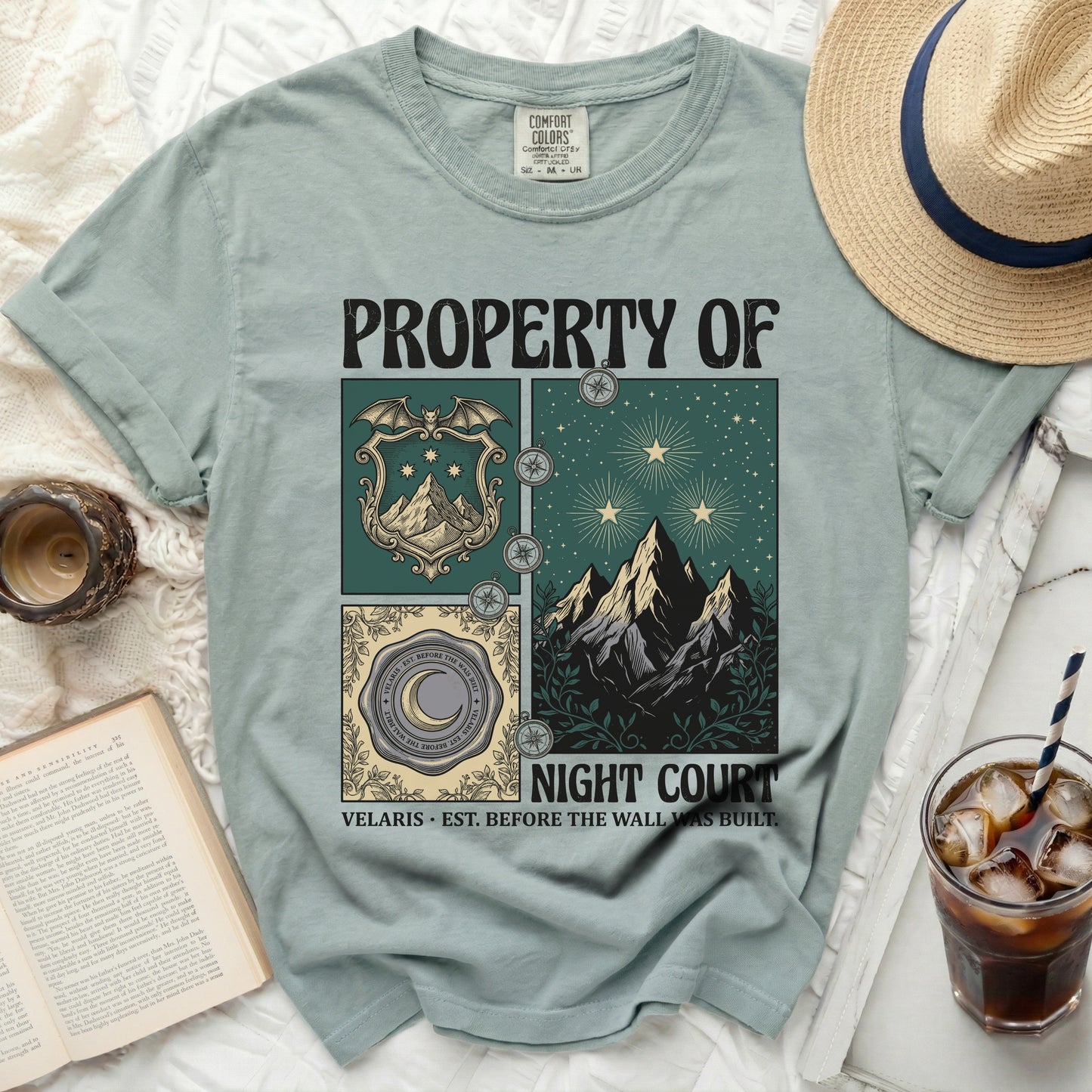 Property of Night Court t-shirt with mountains, stars, moon, and compass design.