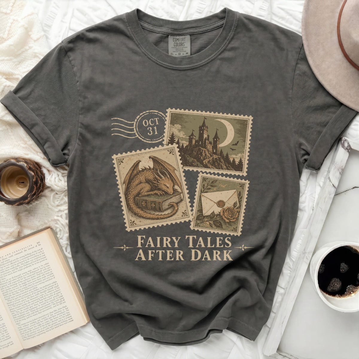 Dark grey t-shirt with "Fairy Tales After Dark" and vintage stamp graphics.