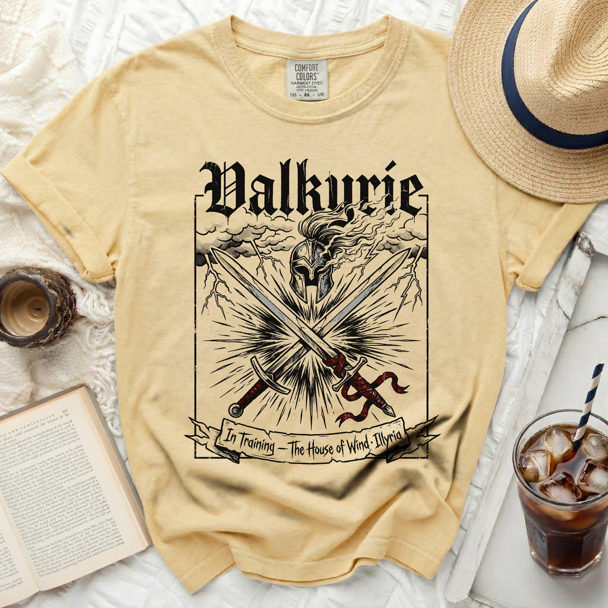 Yellow t-shirt with "Valkyrie" graphic, crossed swords, and helmet.