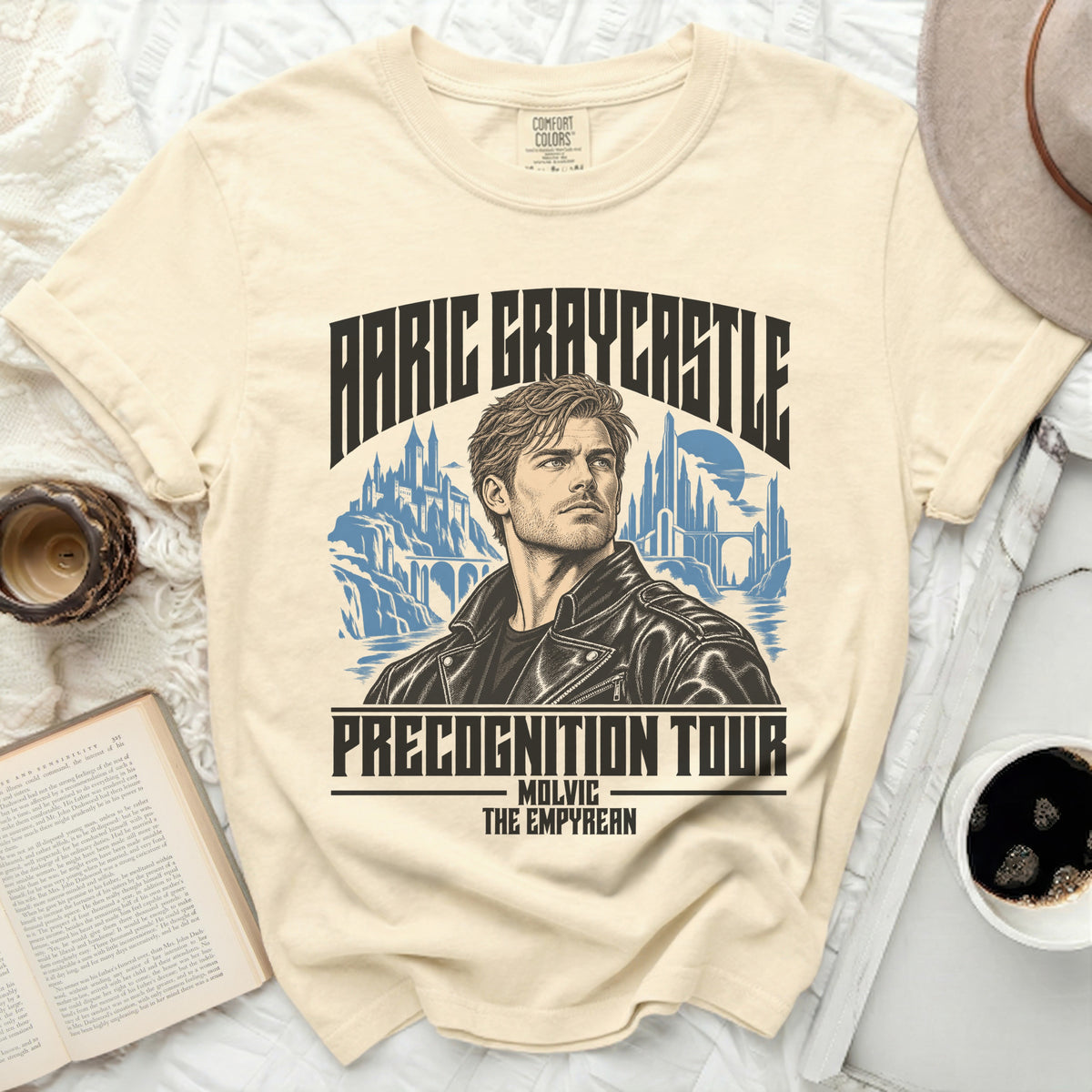 Cream t-shirt with "Aaric Graycastle Precognition Tour" graphic.