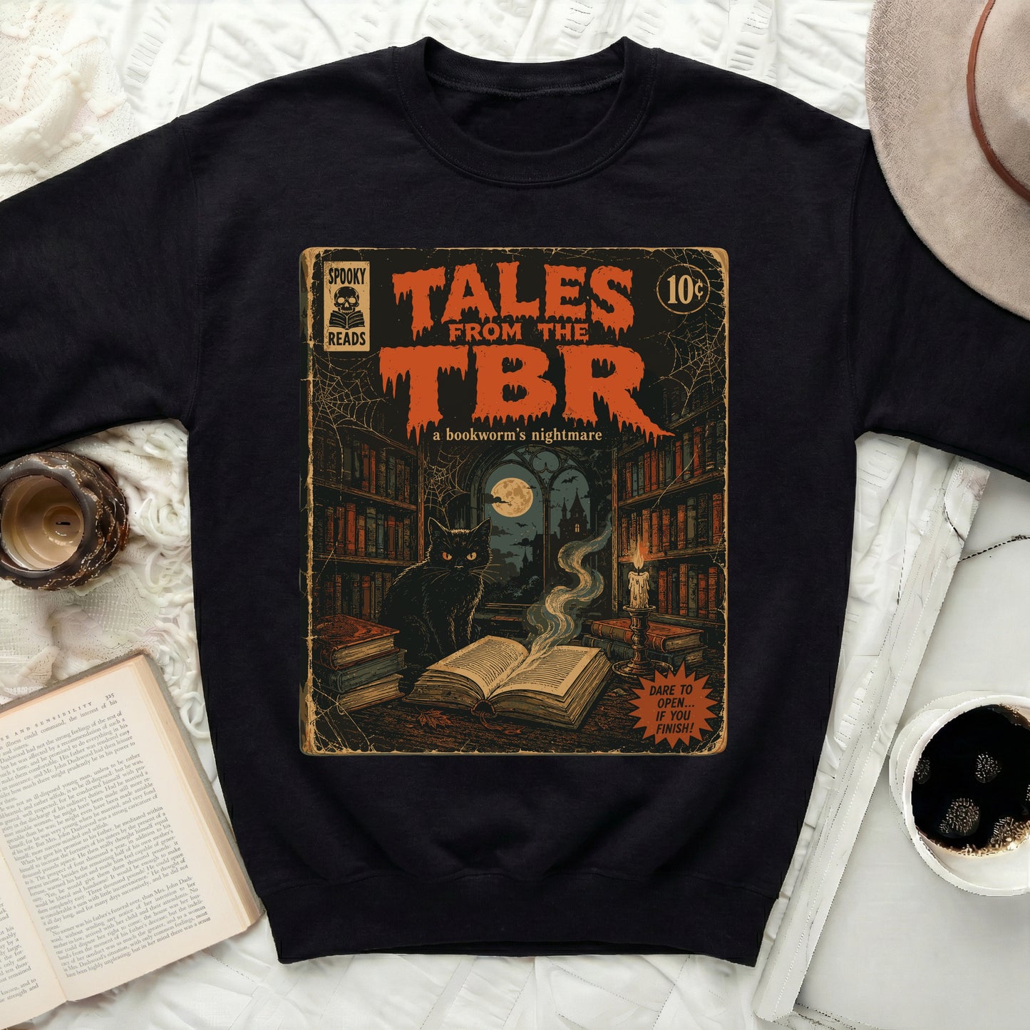 Black sweatshirt with "Tales From The TBR" comic book graphic.