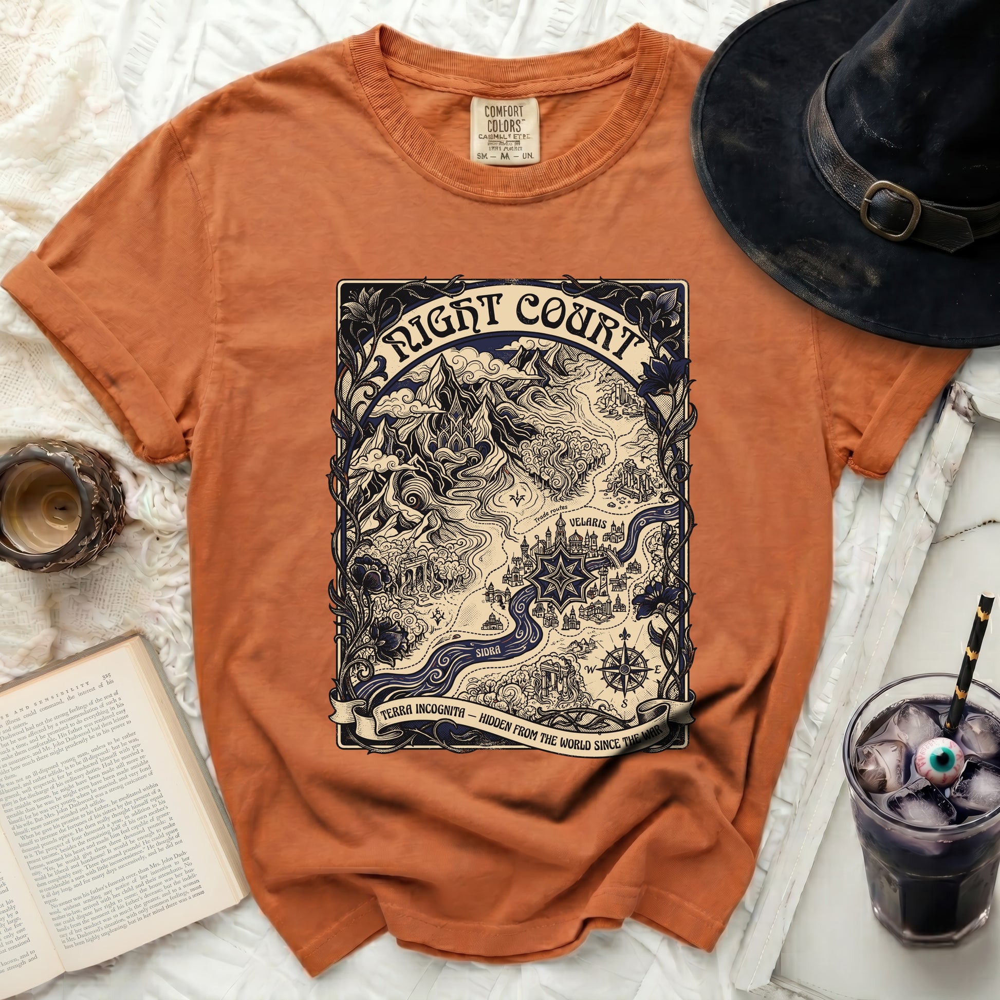 Orange t-shirt with "Night Court" map design, "Velaris", "Sidra", and "Terra Incognita" text.