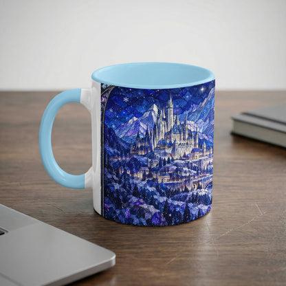 White ceramic mug with light blue handle and rim, featuring a blue stained-glass style fantasy castle illustration.