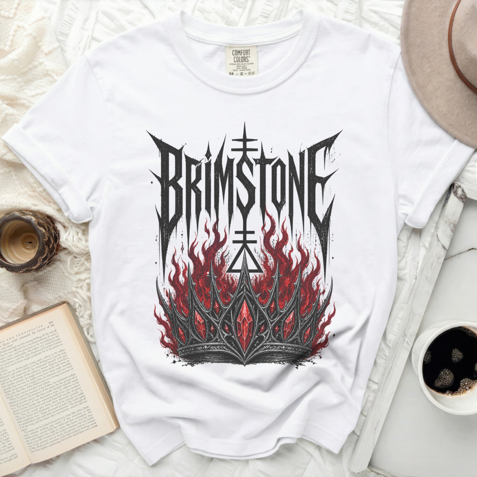 White t-shirt with "BRIMSTONE" in gothic font over a jeweled crown.