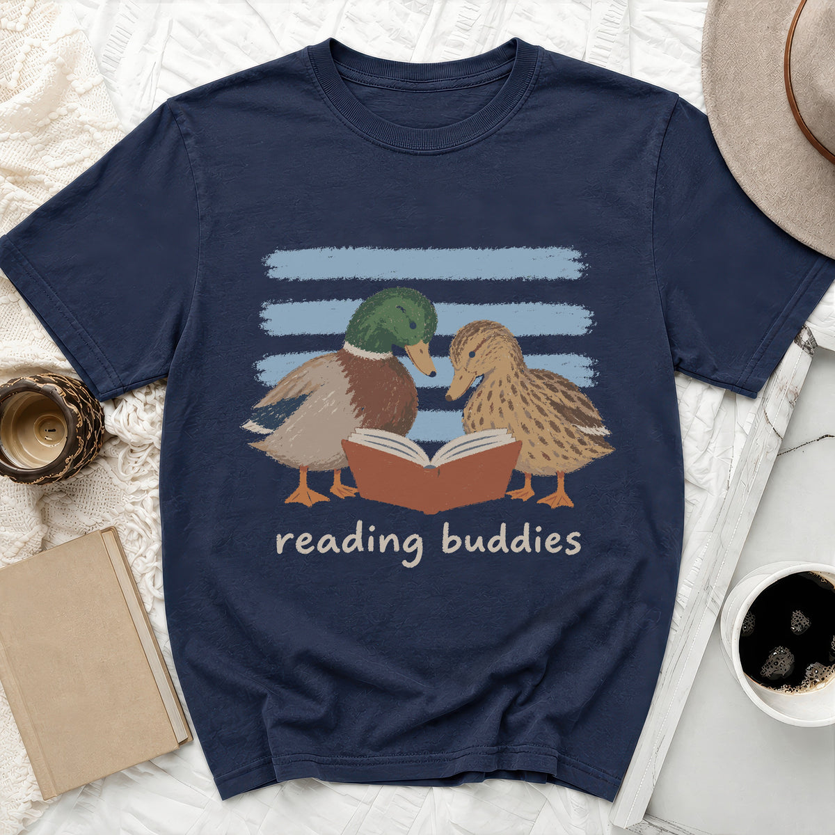 T-shirt with ducks reading a book and text "reading buddies".