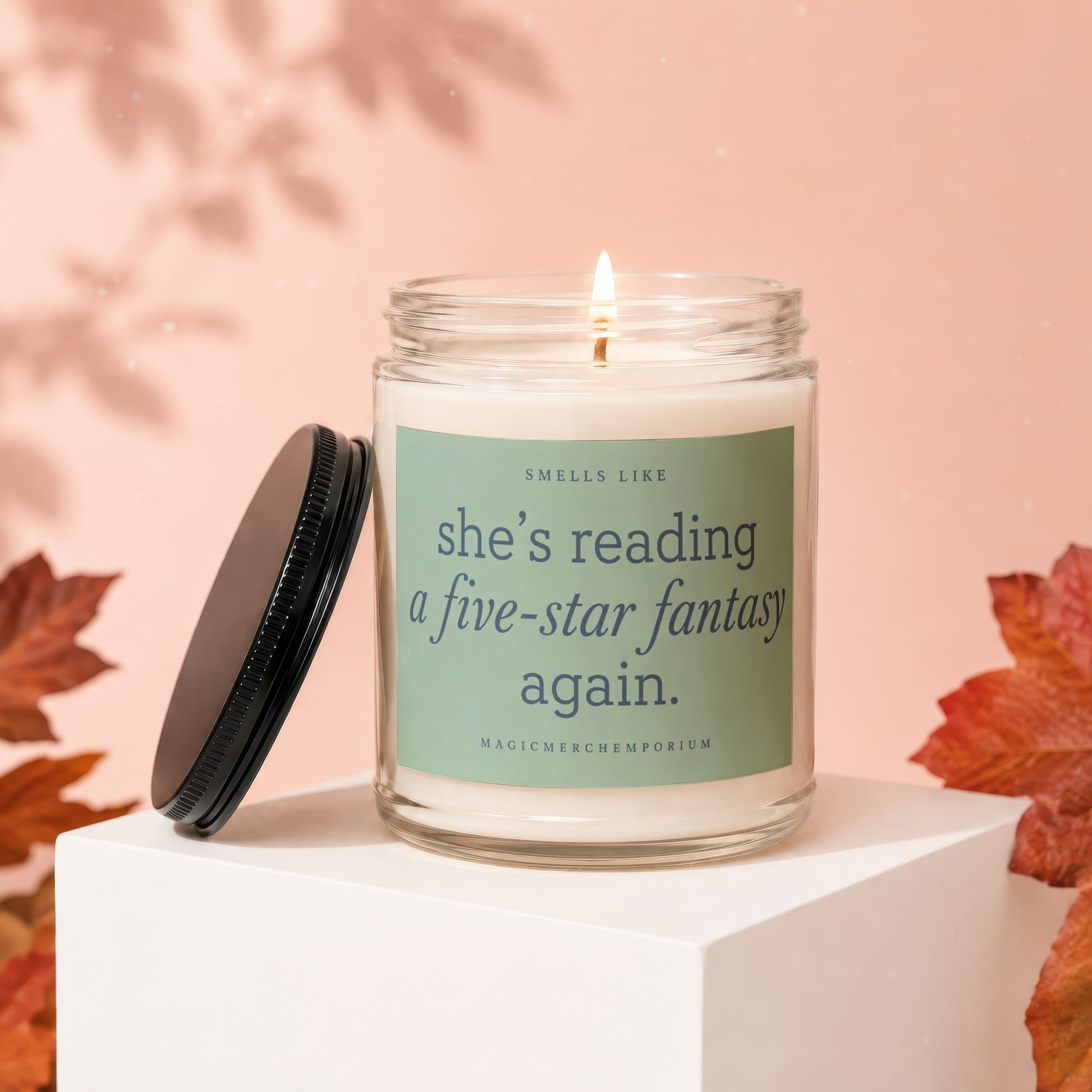 Candle with label that reads: Smells like she's reading a five-star fantasy again.