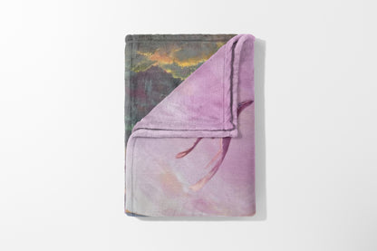 Faux fur throw blanket with abstract pink and gray watercolor floral design.