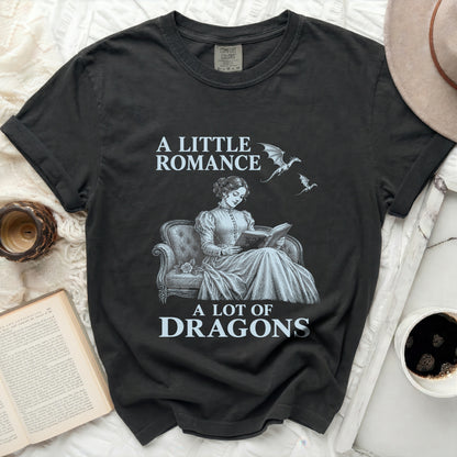 A Little Romance A Lot of Dragons t-shirt with dragons and a woman reading.